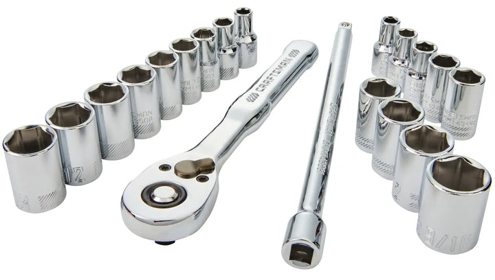 A set of chrome socket wrenches, including a ratchet, an extension bar, and multiple socket sizes, arranged on a white background.