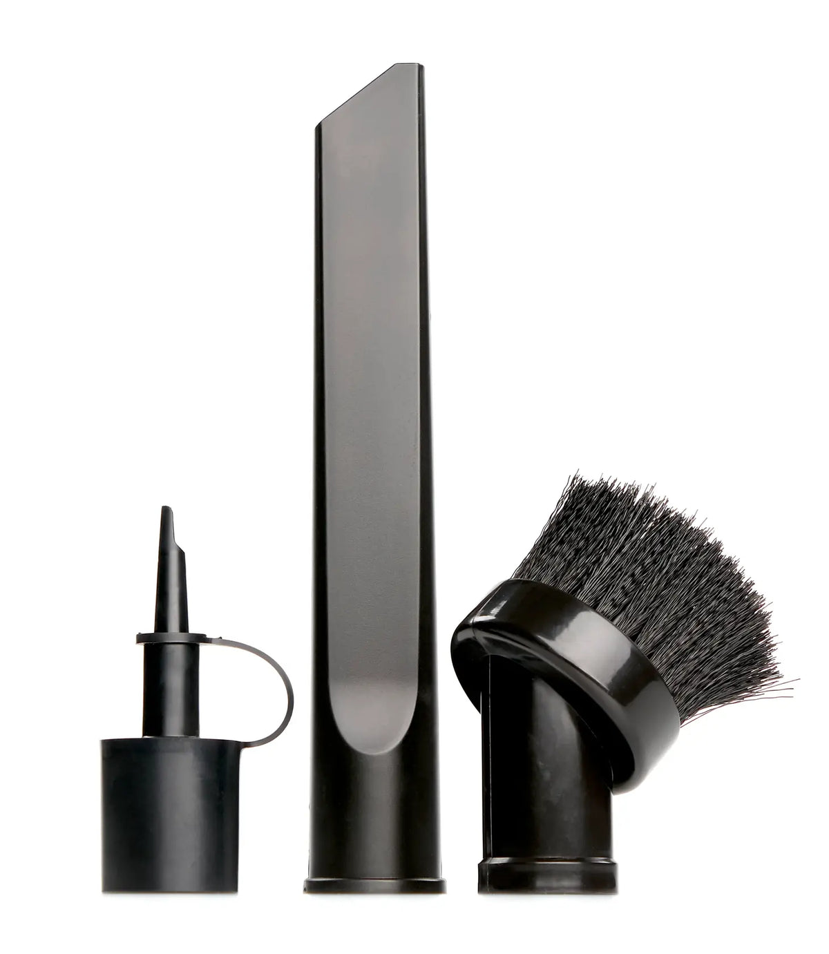 Three black vacuum cleaner attachments are displayed upright on a white background. From left to right: a narrow nozzle tool with a cap, a long crevice tool, and a round brush attachment with bristles.